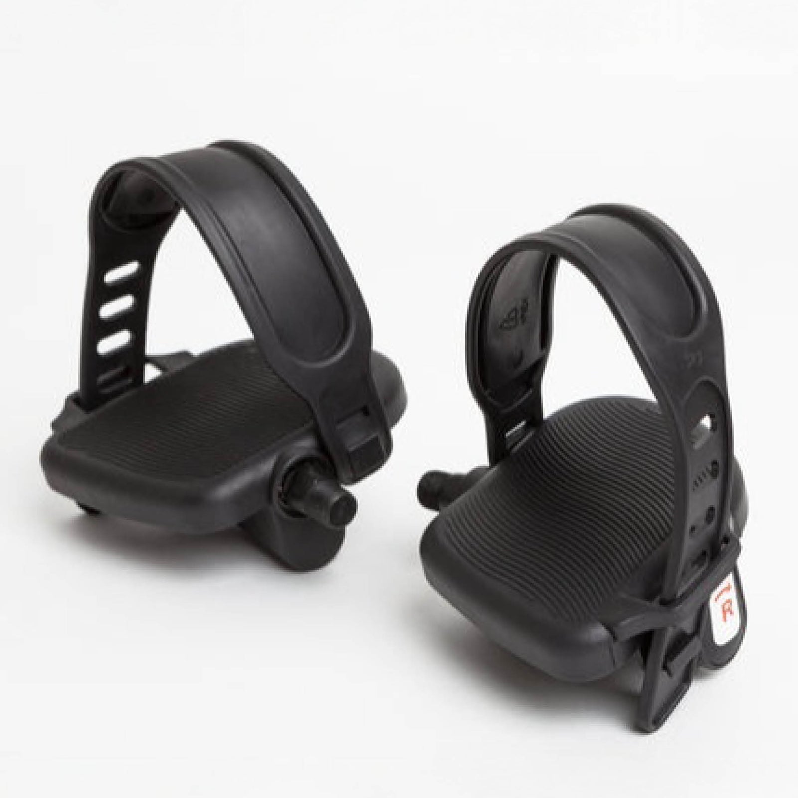 A pair of black pedal straps with wide foot platforms and adjustable plastic straps, designed for the Reviber Mini Bike PRO - Dual Function by Reviber, are shown against a plain white background.